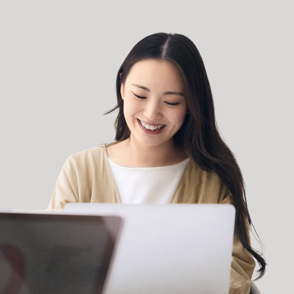 female project manager smiling and holding a tablet